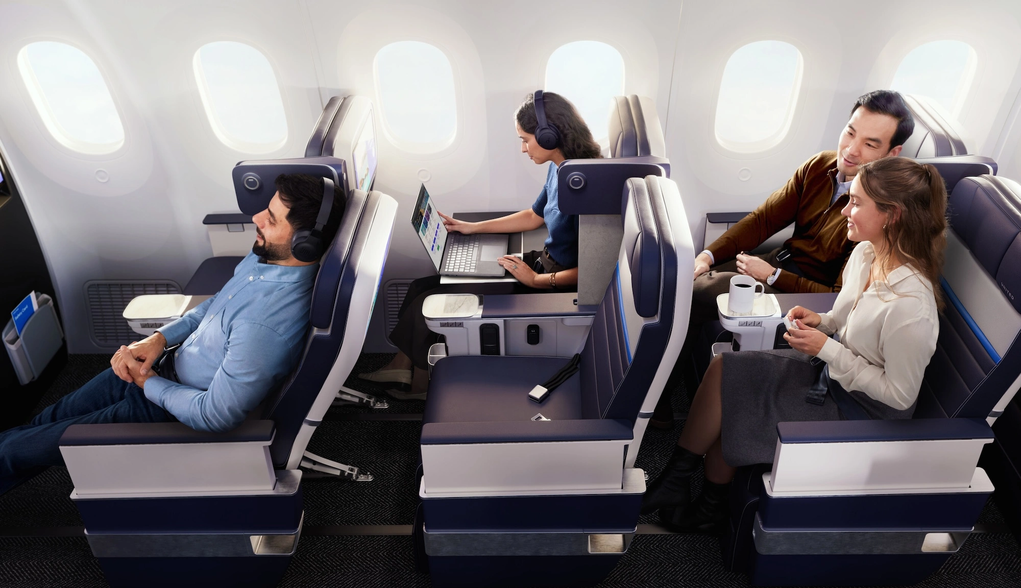 passengers sitting in a United airplane