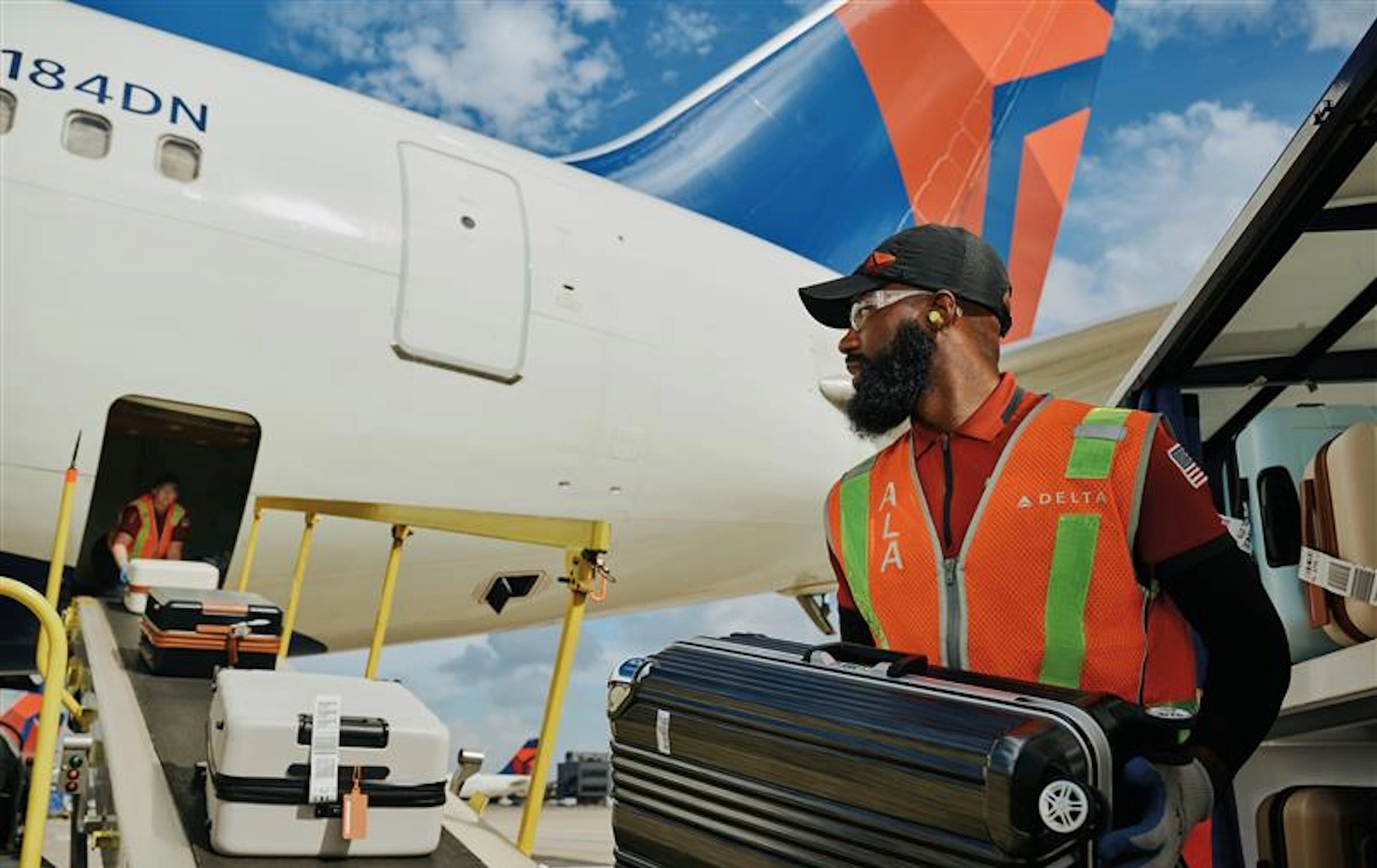 Delta plane and a baggage handler